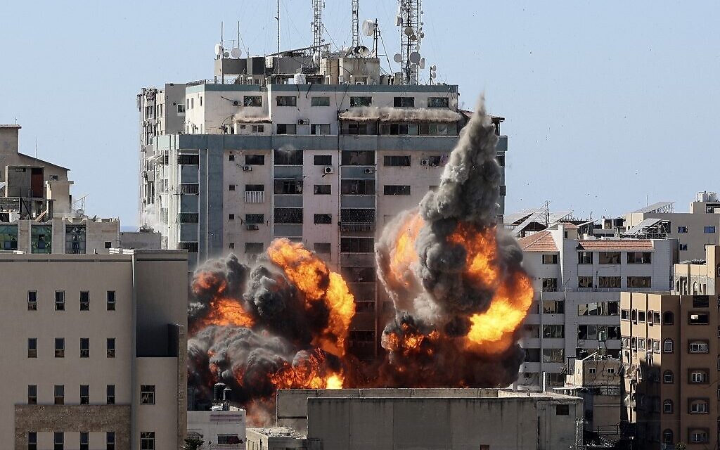 Israel launched scores of airstrikes on Gaza, as calls for a cease-fire became stronger