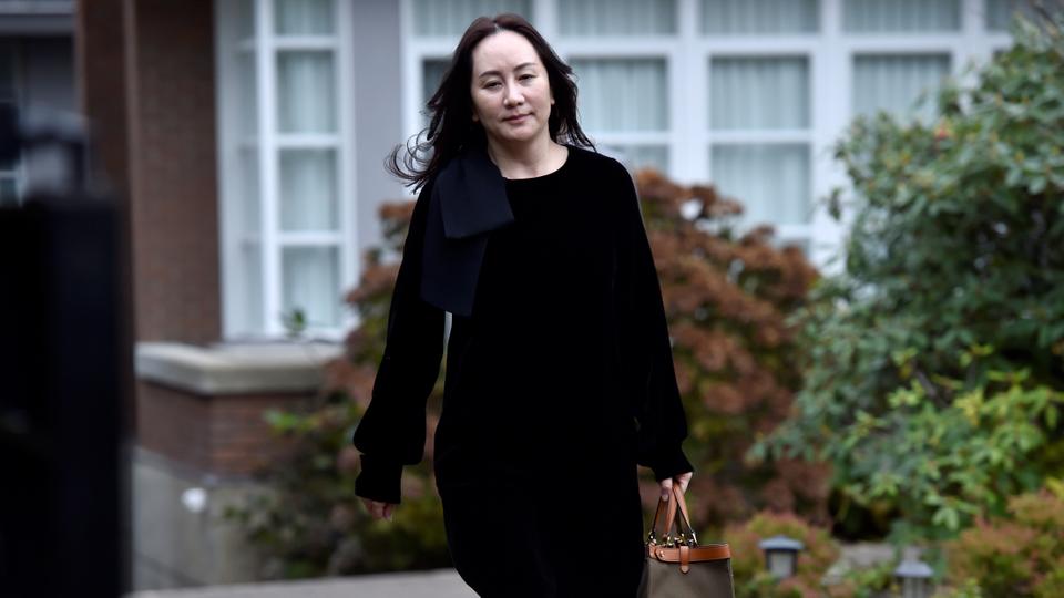 Meng Wanzhou the CFO of Huawei has arrived in China as thousands of people wait to see her