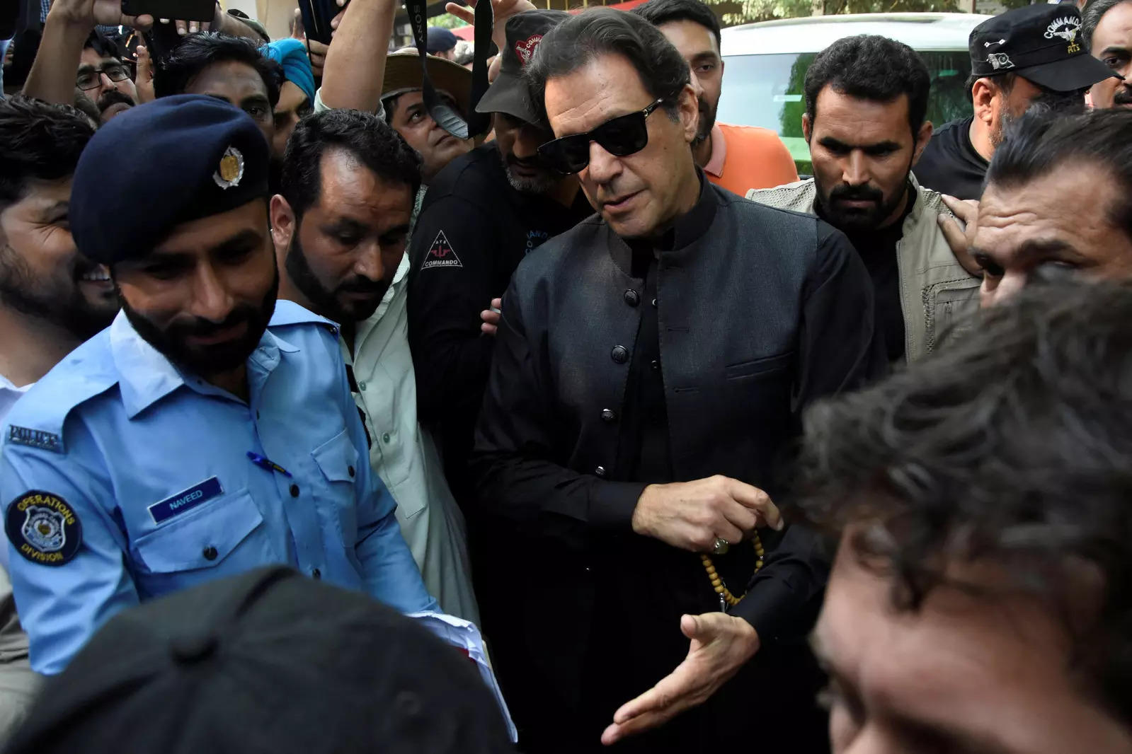 Imran Khan Welcomes Fans After Police Leave The Area Near The Former Pakistan PM's Home