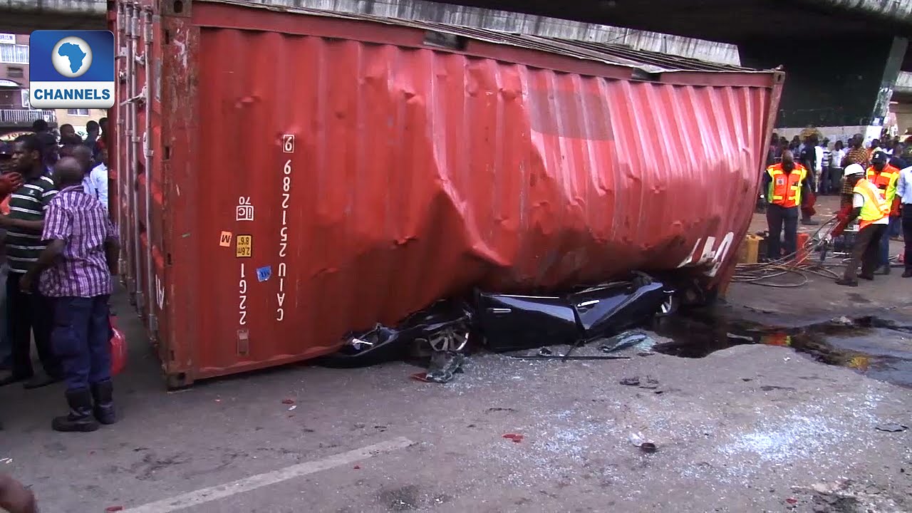 Mayhem In Lagos Again As Container Crushes Vehicle