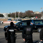 Three Arrested After Coffins Discovered In National Flags At Eiffel Tower