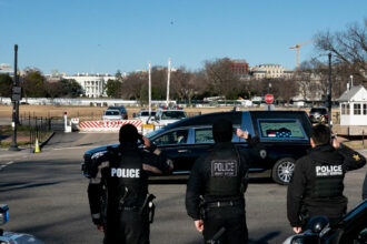 Three Arrested After Coffins Discovered In National Flags At Eiffel Tower