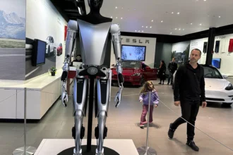 Optimus Unleashed: Tesla's Humanoid Can Now Do It All, Says Musk